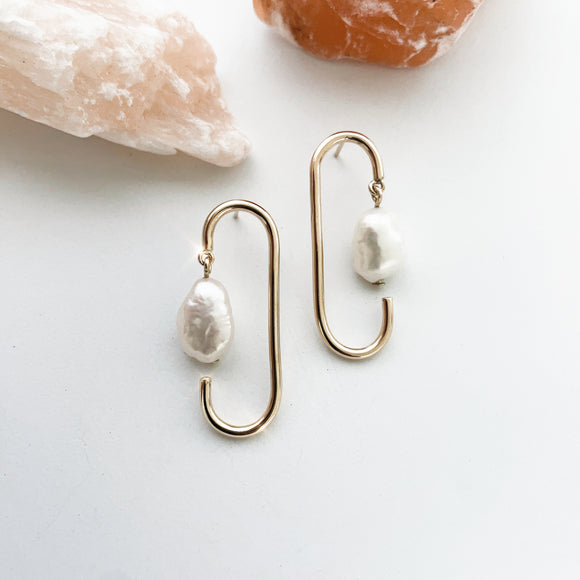 Baroque Collection is Refined Retro, designed elegantly With A Modern Twist.  Beautiful Baroque Freshwater pearl jewelry displays a modern motif emblem that elevates classic pearl designs.  Each pearl displays a unique shape, no two are alike.     14K Gold Filled  Freshwater Baroque Pearl  7/16