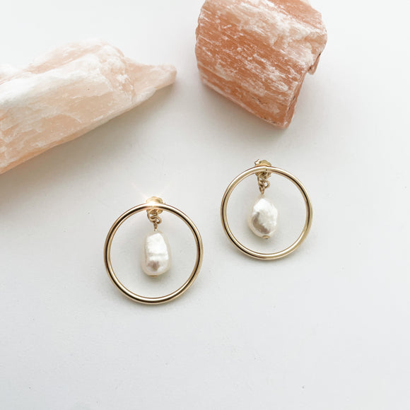 Baroque Collection is Refined Retro, designed elegantly With A Modern Twist.  Beautiful Baroque Freshwater pearl jewelry displays a modern motif emblem that elevates classic pearl designs.  This pair is very playful and versatile with removable pearl charm, and can be worn multiple ways.  Each pearl displays a unique shape, no two are alike.