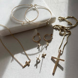 Keep your faith close wherever you go. Sideways Cross Necklace is dainty and versatile that is worn perfectly as choker or necklace.     Each cross charm is carefully handmade with 14k Gold Filled.     14K Gold Filled  Cross size: 1cm x 0.8cm (0.4" x 0.3")  Models are wearing 14" long.