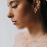 UNLEASH YOUR INNER STRENGTH AND AWAKEN THE HIDDEN GODDESS WITHIN.  Captivate the room with feminine strength and natural elegance. The unique texture and design of a golden lasso symbolize unwavering strength and driven force. You are assertive and ambitious. Embrace the elegance of natural beauty with our Goddess Lasso Studs and bring out the goddess inside you. Whether for work or an evening out, our Goddess Collection will surely add boldness to your look.   Unisex. 14K Gold Filled. Nickel Free.