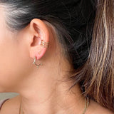 Dewdrop Collection - You didn't know you need, but now you won't be able to live without!  Start a new day with dewdrop hoops that bring magic and spark joy in your life.  Chic element and edgy silhouette combined to create the perfect pair of unique statement hoops. This small hoops go perfect for everyday wear with any stack.      14k Gold Filled  Approximately 3/4" diameter 