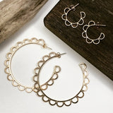 Most Popular Earrings Of All Time!  Attention to all the hoop lovers! Upgrade your hoop collection with these unique, floral, feminine silhouette hoops and make a bold statement.     Materials  14K Gold Filled  2 1/4” diameter      