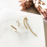Got many piercings or just one? Add a flowy motion and upgrade your ear party to the next level with this Barrel Drop Chain Earring.     14K Gold Filled  2" Long  *Sold as a single.