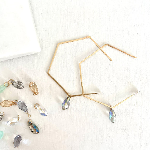 Hexagon Hoops with swarovski crystals. Geometric Hoops. Geo Hoops with crystals. Resigned our original GEO Hoops.  STYLE versatile, BE luxury.  They can be worn in 2 ways - dazzle them with your choice of Swarovski crystals or    wear them simple as plain hoops.    14K Gold Filled  Swarovski crystals  Size w/ crystal: approximately 2 3/8
