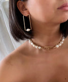 Baroque Collection is Refined Retro, designed elegantly With A Modern Twist.  Beautiful Baroque Freshwater pearl jewelry displays a modern motif emblem that elevates classic pearl designs.  Each pearl displays a unique shape, no two are alike.     14K Gold Filled  Freshwater Baroque Pearl  7/16"W X 1 1/4"H     Due to the unique nature of freshwater pearls, exact colors and shapes may vary slightly from the picture shown. 