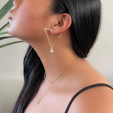 Triangle Hoops with swarovski crystals. Geometric Hoops. Geo Hoops with crystals. Resigned our original GEO Hoops.  STYLE versatile, BE luxury.  They can be worn in 2 ways - dazzle them with your choice of Swarovski crystals or    wear them simple as plain hoops.    14K Gold Filled  Swarovski crystals  Size w/ crystal: approximately 2 3/8"  *They come with rubber backings.