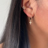 Keep your faith close wherever you go.  Cross Huggie Hoop Earrings are classy, dainty and perfect size for everyday wear.   Each cross charm is carefully handmade with 14k Gold Filled.     14K Gold Filled  Cross size: 7mm x 6mm (0.27" x 0.23")  Hoop size: 13mm (1/2") in diameter 