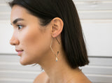 Diamond Hoops with swarovski crystals. Geometric Hoops. Geo Hoops with crystals. Resigned our original GEO Hoops.  STYLE versatile, BE luxury.  They can be worn in 2 ways - dazzle them with your choice of Swarovski crystals or    wear them simple as plain hoops.    14K Gold Filled  Swarovski crystals  Size w/ crystal: approximately 3"  *They come with rubber backings.