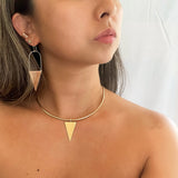 Be authentic. Be original. Your true self is as beautiful as nature itself. Stay confident and stay real with our Golden Triangle collection.  Our Golden Triangle Curve Bar Necklace’s simple design will fit with any style. It is elegant enough to compliment your evening wear yet versatile enough to accentuate your casual wear.   Golden Triangle charm is removable. The two-way design of this piece allows you to play with your style. You can be bold, strong, and confident.  14K GOLD FILLED.