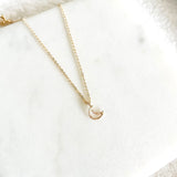 Add to your child’s adorable look with our Mini Moon necklace. Let your little ones glow up with their very own Mini Moon necklace. 14K Gold Filled, Nickel Free