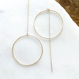 The Circle Threader 2.0 elevates the original design to the chicest with the addition of the dainty chain threader.    Despite their large size, these playful threaders embody a feminine look in the most delicate way. Perfect for everyday wear from work to play.      14K Gold-Filled  6 5/8” length