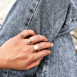 Our dainty classic band adds just the right amount of class and chic to your style! Wear alone for an elegant look or stack it with our other rings to create your own unique and personal style!      14K Gold Filled  Nickel Free