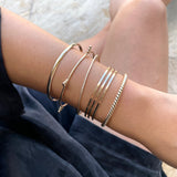 Smart Chic + Minimalistic Bold  Urban inspired vintage look with a modern twist.  Twisted Rope cuff bracelet is a statement piece with a touch of elegant casual that transcends season or any style. It's perfect on its own or stacked with other bracelets.   14k gold-filled