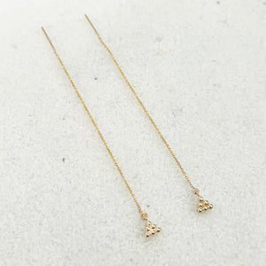 Dewdrop Triangle Threader Earrings are minimalist in nature with a playful touch embodied in a chic look.  Designed to be worn through one or multiple piercings and perfect for everyday wear from work to play.