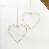 The Heart Threader 2.0 elevates the original design to the chicest with the addition of the dainty chain threader.    Despite their large size, these playful threaders embody a feminine look in the most delicate way. Perfect for everyday wear from work to play.      14K Gold-Filled  6 5/8” length