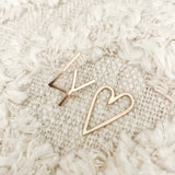 Handwritten love letters are the perfect reminders that love is all around. Show your love without words.  LY ♡︎ (Love You Heart) Earrings*  are the perfect little love note.     14k Gold Filled  Size: 1”H x 5/8”W     *handwritten collection pieces may have slight shape variations.   