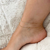 Sophisticated summer look from ground up with our dainty + classy anklets♡︎  Delicate and durable rolo chain adorned with subtle flower charm from our Dewdrop Collection - perfect anklet for any outfit, any mood!     14K Gold Filled 