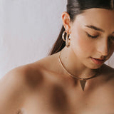UNLEASH YOUR INNER STRENGTH AND AWAKEN THE HIDDEN GODDESS WITHIN.  Captivate the room with feminine strength and natural elegance. The unique texture and design of a golden lasso symbolize unwavering strength and driven force. You are assertive and ambitious. Embrace the elegance of natural beauty with our Goddess Lasso Hoops and bring out the goddess inside you. Whether for work or an evening out, our Goddess Collection will surely add boldness to your look.   Unisex. 14K Gold Filled. Nickel Free.